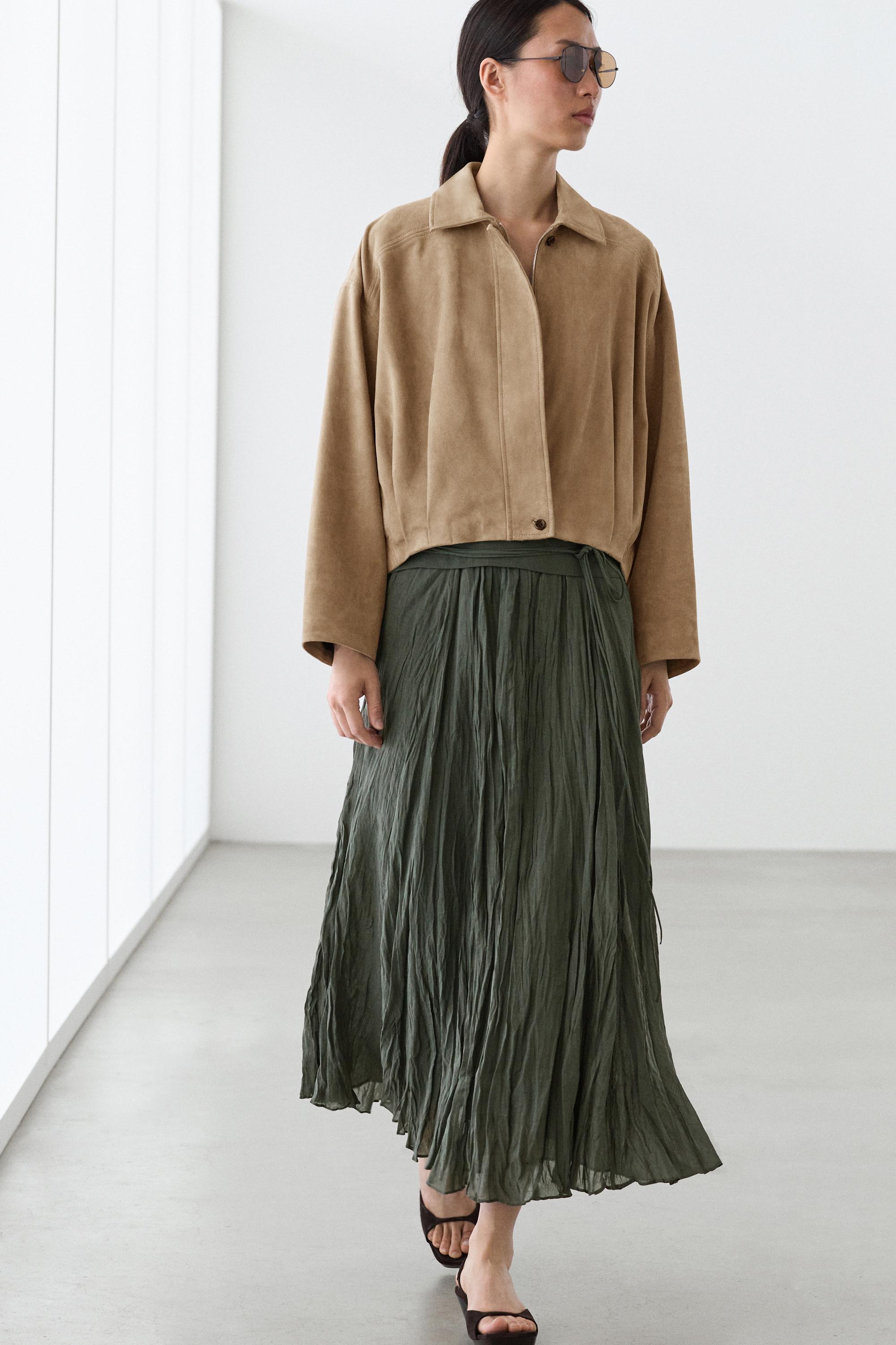 Blouson bomber plissé en cuir et daim
